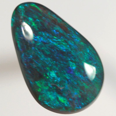 SOLID BLACK OPAL Full on green and blue fire always  SEE VIDEO